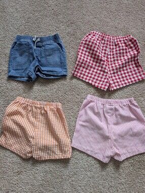 Girls 4-Pack Pull-On Shorts — Blue, Red, Orange, Pink